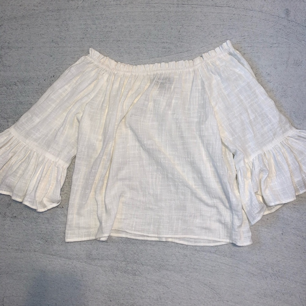 White blouse off the shoulder